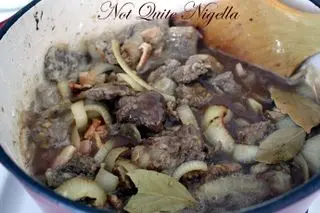 beef beer stew stirring