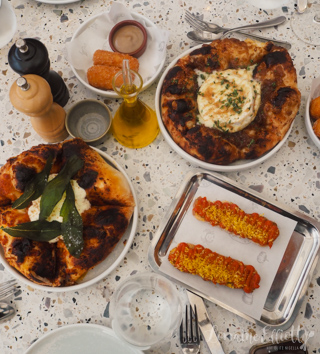 Flatbread and manchego croquettes at Iron Gate